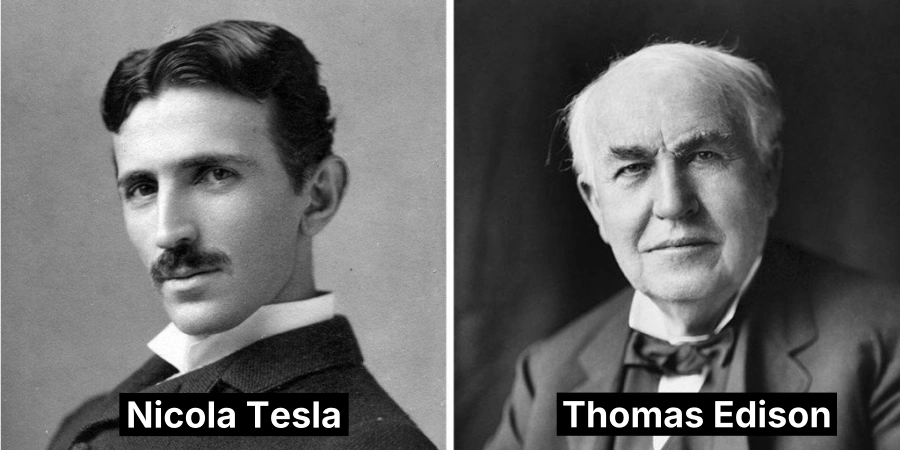 A black-and-white side-by-side portrait featuring Nikola Tesla on the left, a young man with a mustache and formal attire, and Thomas Edison on the right, an older man with white hair and a bow tie, both dressed in suits.