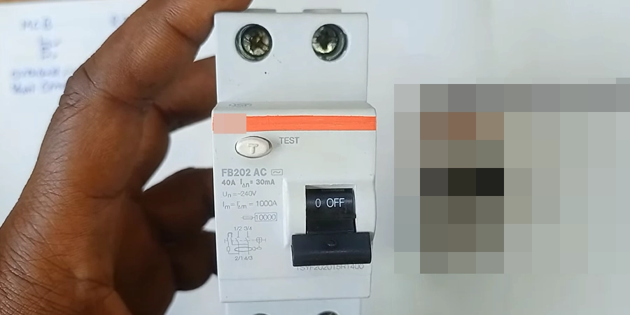 An FB202 AC residual current circuit breaker rated at 40A and 30mA, held in a hand, with a black switch in the OFF position, orange test button, and technical specs including 240V voltage and 1000A breaking capacity, against a white background with another breaker visible.