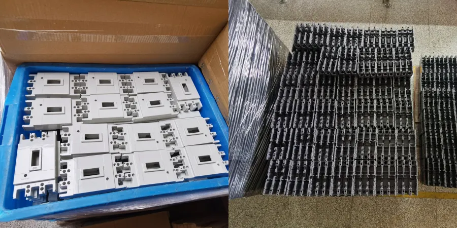 A split image showing MCCB covers and bases; the left side displays white MCCB covers arranged in a blue tray inside a cardboard box, while the right side shows stacks of black MCCB bases wrapped in plastic on a pallet, ready for assembly or distribution.