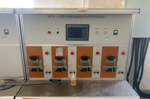 An industrial calibration system for MCBs (Miniature Circuit Breakers), designed to verify auto-reclosing, time-delay, and tripping characteristics. The equipment features a central control panel with a display, control buttons, and indicator lights, along with four independent test stations equipped with actuators for mounting and cycling MCBs during automated calibration and quality inspection in electrical device manufacturing.